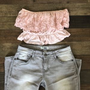 Blush pink tube top with lace detail.